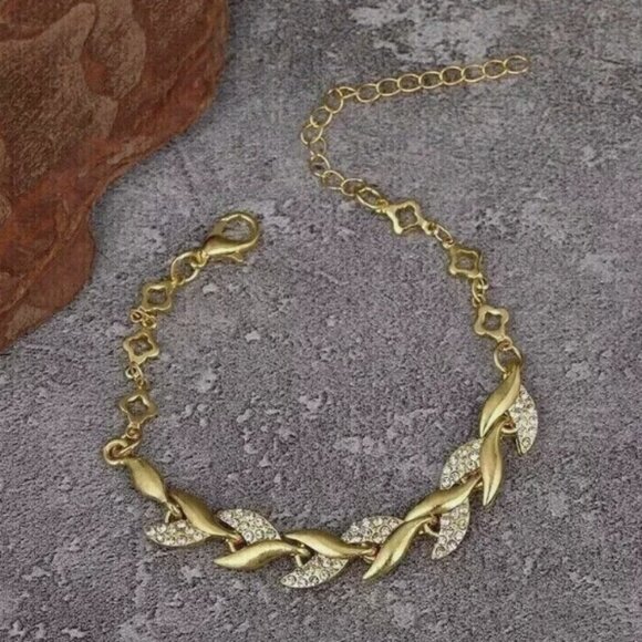 Gold Leaf Bracelet: An elegant bracelet featuring leaf-shaped - Picture 2 of 2